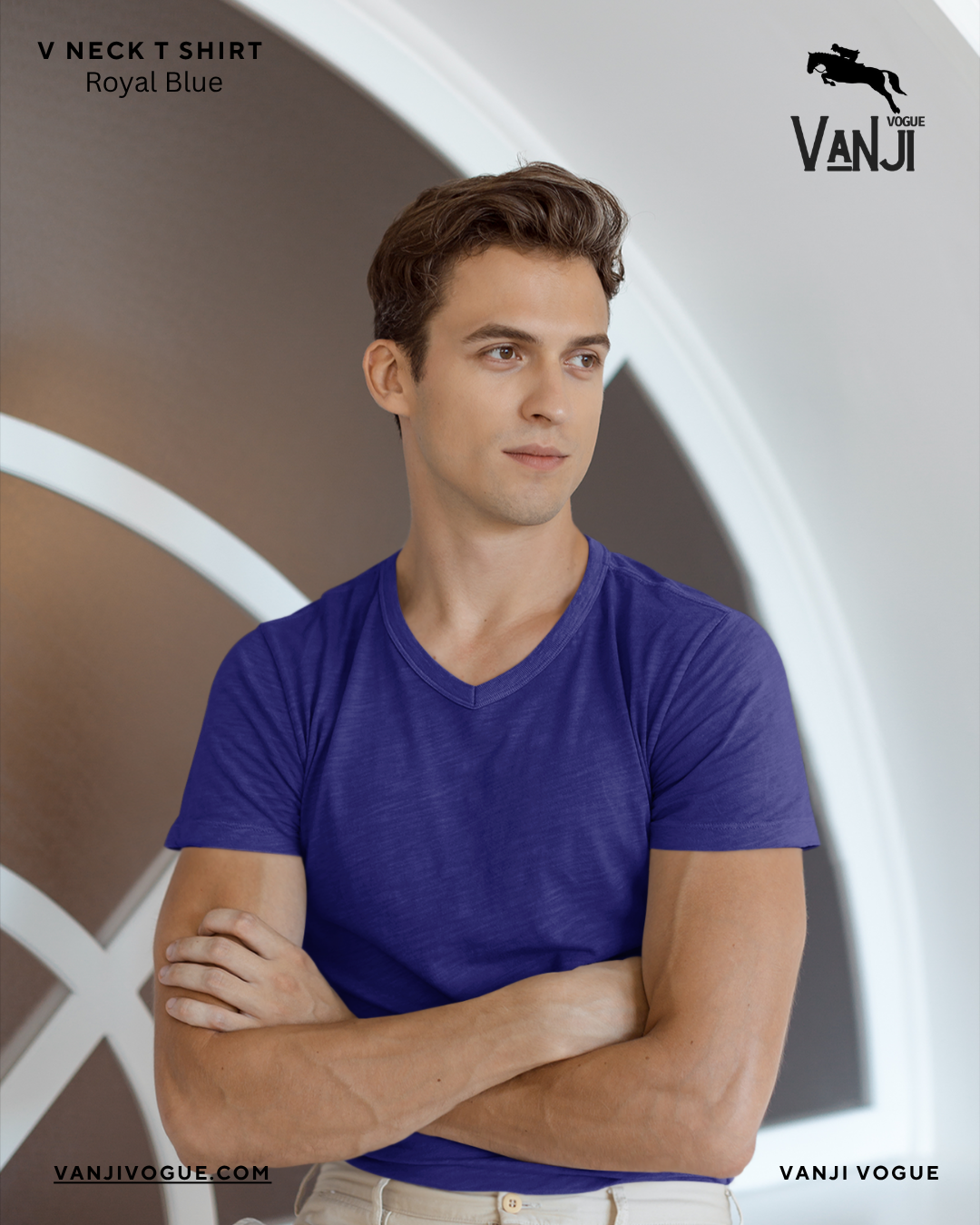 Man wearing a royal blue v neck shirt with short sleeves and a fitted style
